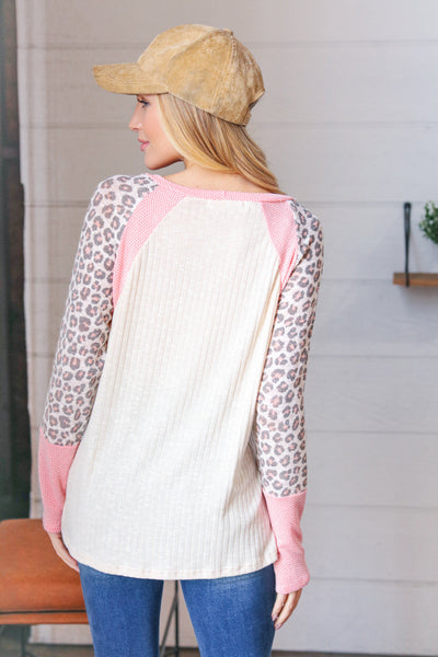 Coral Animal Print Two Tone Raglan Top